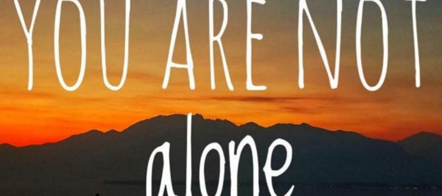 Nature image with slogan "You are not alone"